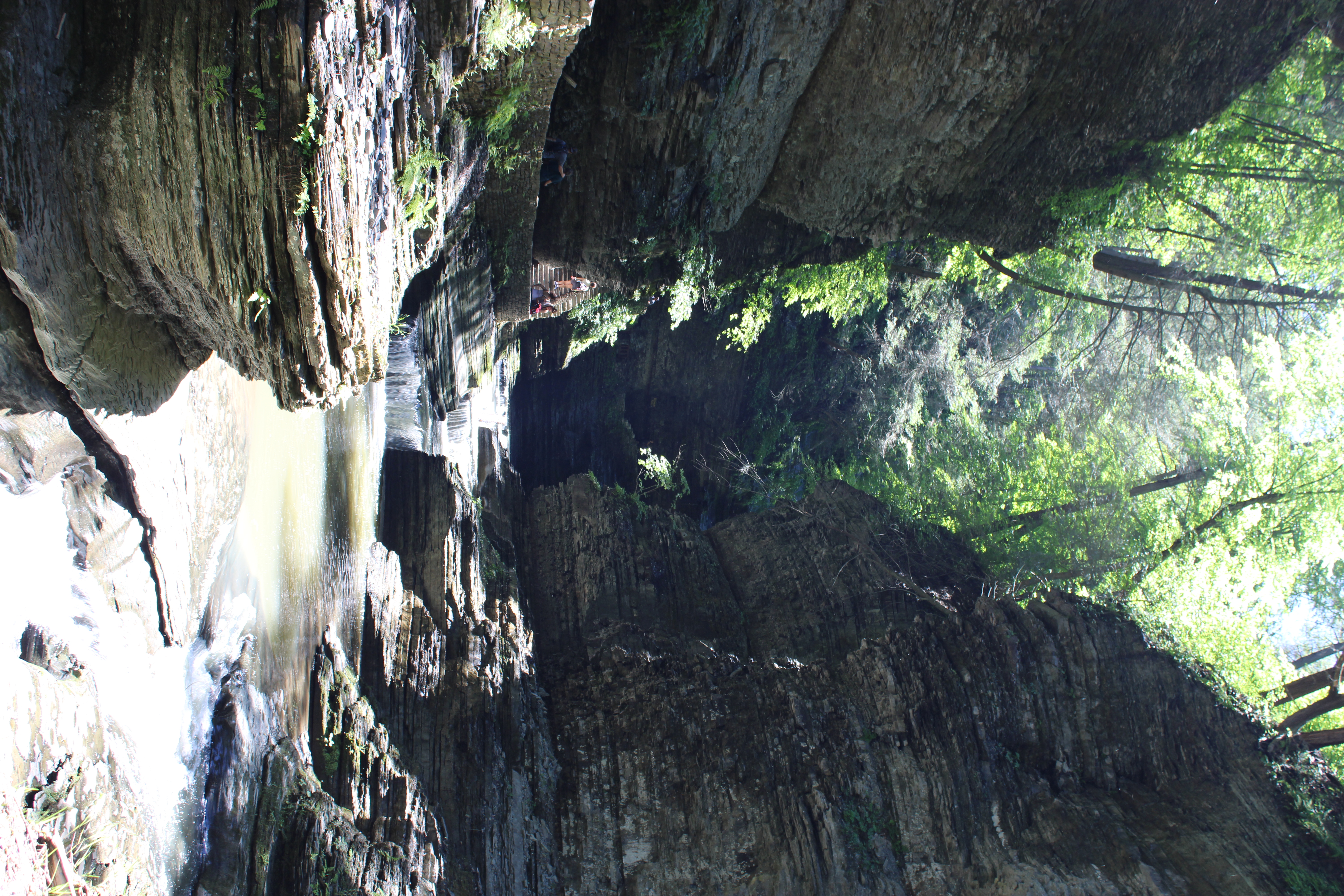Layered gorge and small cascades at Watkins Glen photographed handheld at 1/40 second
